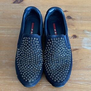 Prada Women's Black sneaker slip on with studded black and silver crystal’s